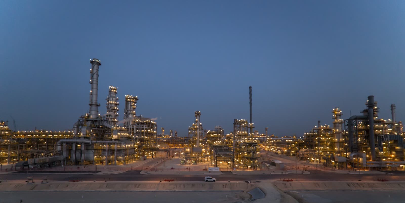 Industrial plant lit at dusk